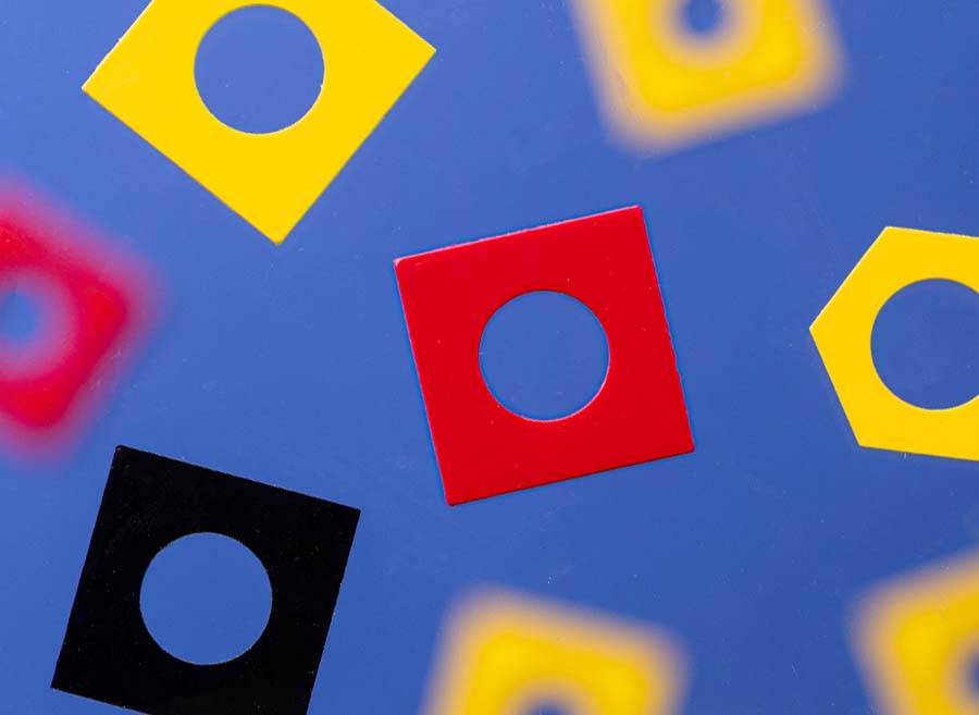 Precision punched and water jet cut rigid PVC washers and spacers